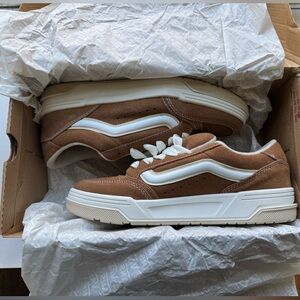 Brown and white Vans